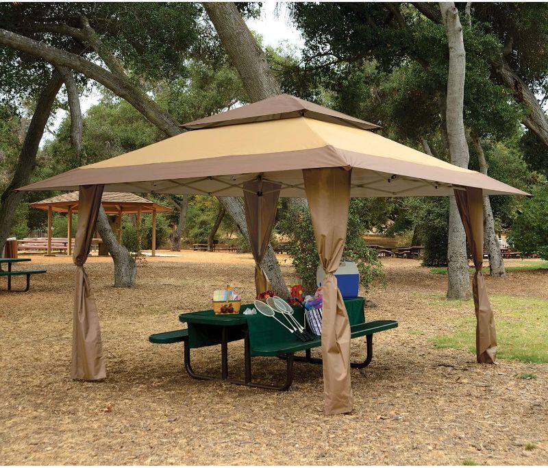 Photo 1 of ***USED - MISSING CANOPY - FRAME ONLY - UNABLE TO VERIFY FUNCTIONALITY***
Z-Shade 13 x 13 Foot Instant Gazebo Canopy Tent Outdoor Patio Shelter, Tan Brown