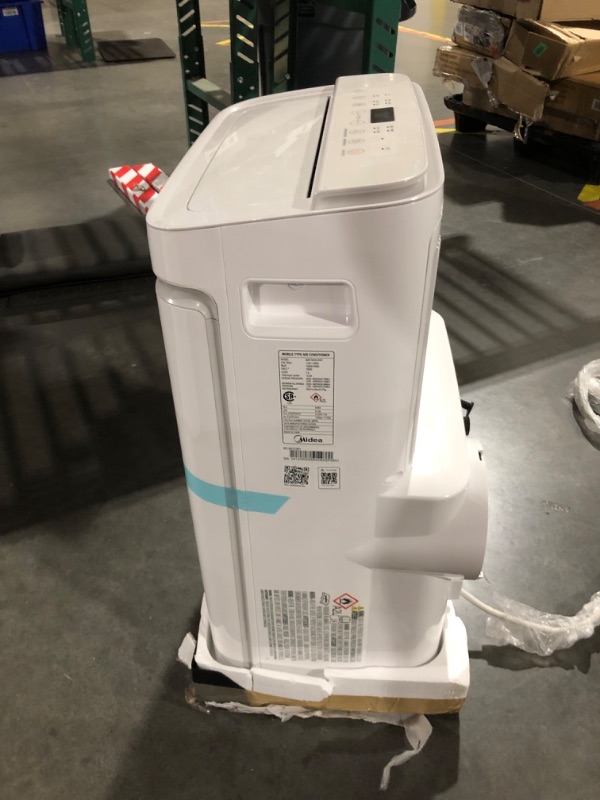 Photo 9 of ***USED - POWERS ON - UNABLE TO TEST FURTHER***
Midea 14,000 BTU ASHRAE (10,000 BTU SACC) Portable Air Conditioner, Cools up to 375 Sq. Ft., with Dehumidifier & Fan mode & Heat, Smart & Remote Control with Remote, Easy-to-use and Install