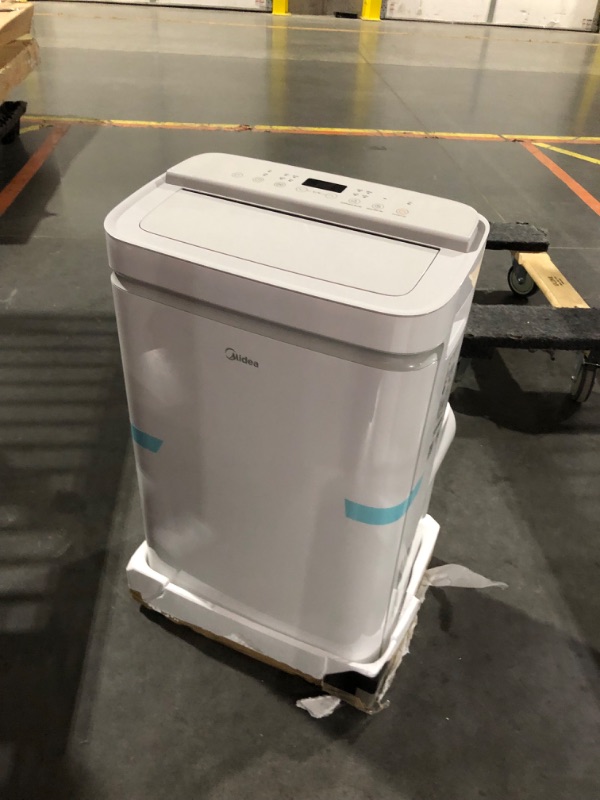 Photo 8 of ***USED - POWERS ON - UNABLE TO TEST FURTHER***
Midea 14,000 BTU ASHRAE (10,000 BTU SACC) Portable Air Conditioner, Cools up to 375 Sq. Ft., with Dehumidifier & Fan mode & Heat, Smart & Remote Control with Remote, Easy-to-use and Install