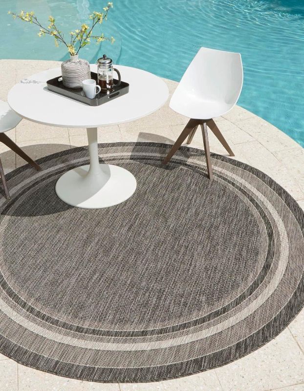 Photo 1 of ***STOCK PHOTO FOR REFERENCE ONLY***
Unique Loom Outdoor Border Collection Area Rug - Soft Border (12' Round Black/Ivory)