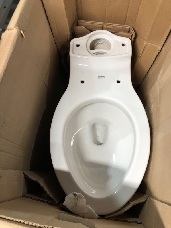 Photo 7 of ***HEAVILY USED AND DIRTY - LIKELY MISSING PARTS - UNABLE TO VERIFY FUNCTIONALITY***
Champion Two-Piece 1.28 GPF Single Flush Elongated Chair Height Toilet with Slow-Close Seat in White
