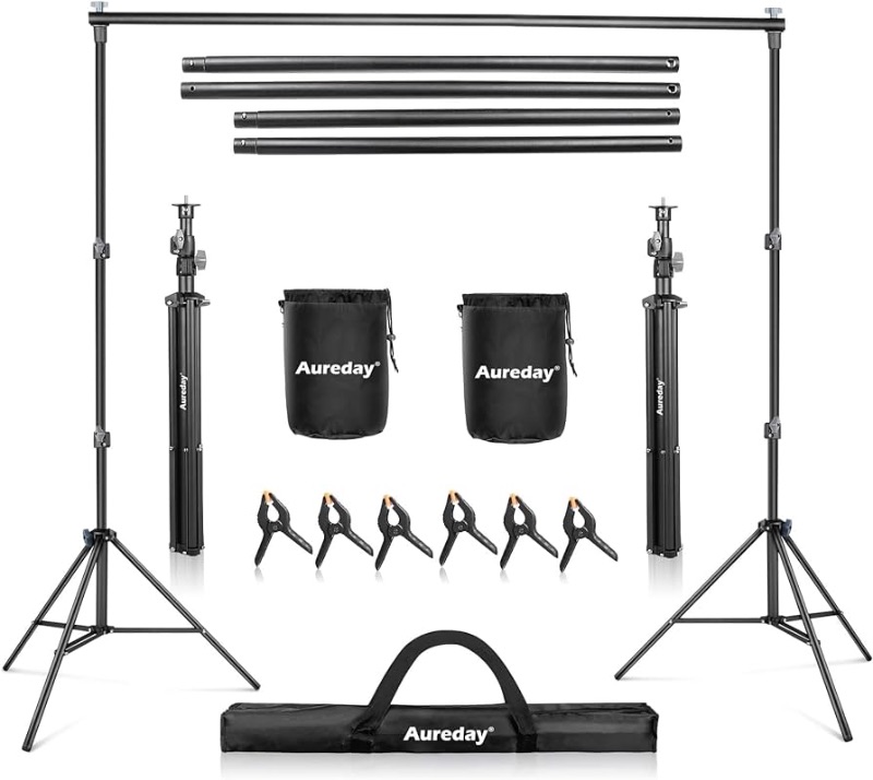 Photo 1 of ***FACTORY SEALED***Aureday Backdrop Stand, 10x7Ft Adjustable Photo Backdrop Stand Kit with 4 Crossbars, 6 Background Clamps, 2 Sandbags, and Carrying Bag for Parties/Wedding/Photography/Festival Decoration