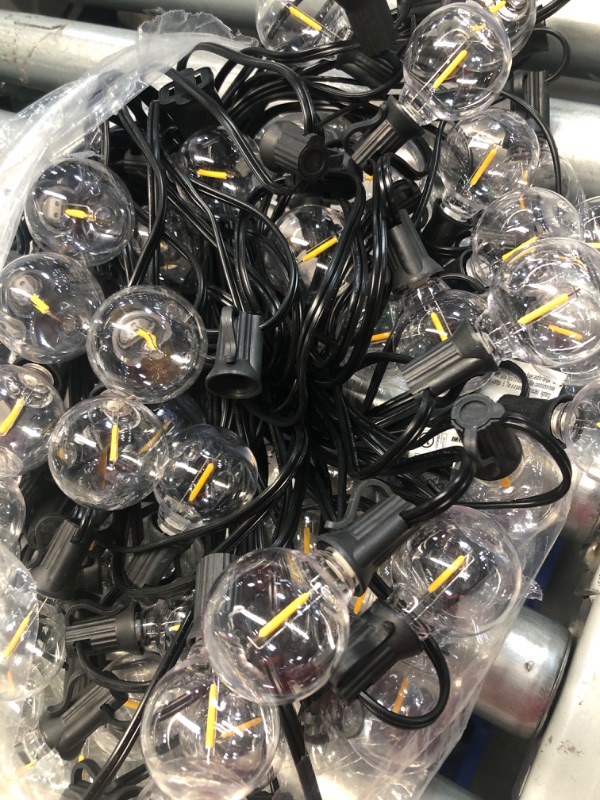 Photo 3 of **USED MISSING BULBS**Svater Outdoor String Lights 200 FT, Patio Lights with 104 Shatterproof LED Bulbs, Commercial Grade Waterproof Plastic Hanging Lights for Bistro Backyard Cafe Market, Warm White 2700K (2 X 100 FT)
