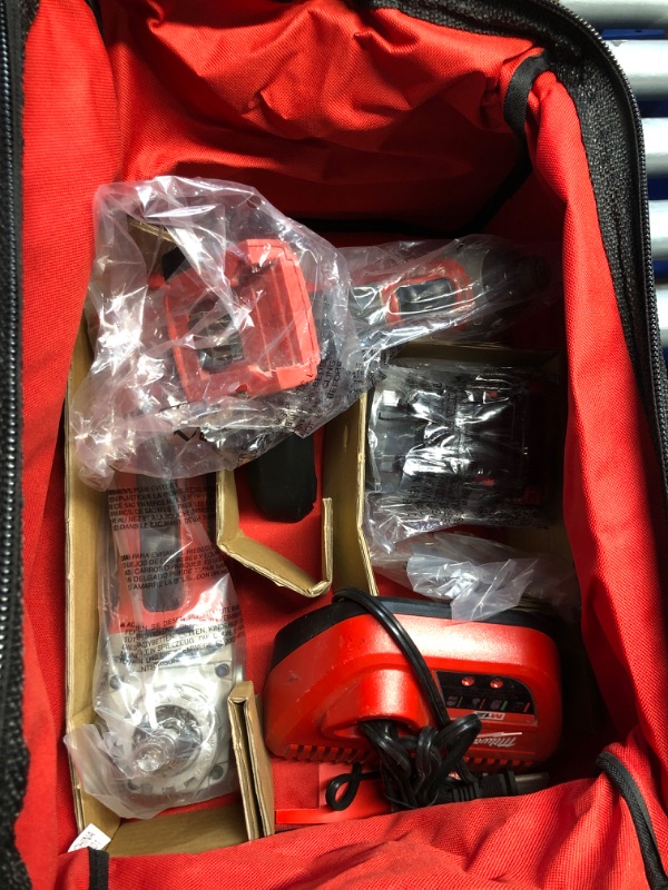 Photo 2 of **SEE NOTES**
Milwaukee M18 FUEL 18V Lithium-Ion Brushless Cordless Grinder & 3/8 in. Impact Wrench Combo Kit (2-Tool) w/ Two 5Ah Batteries Milwaukee #