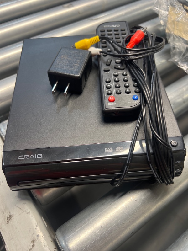 Photo 2 of ***STOCK PHOTO REFERENCE ONLY*****USED**
Craig CVD401A Compact HDMI DVD Player with Remote in Black | Compatible with DVD-R/DVD-RW/JPEG/CD-R/CD-R/CD | Progressive Scan | Up-Convert to 1080p |
