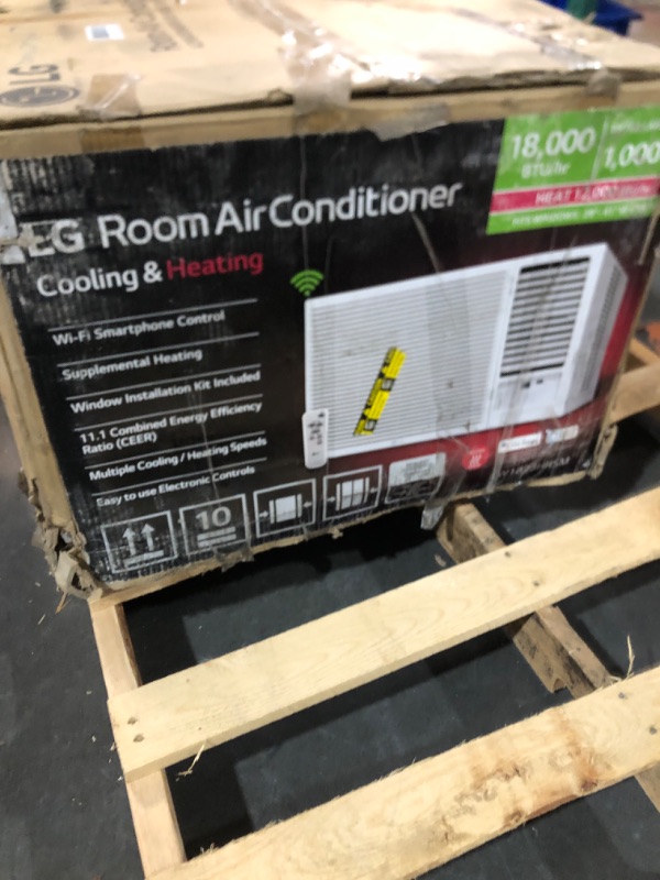 Photo 1 of ***TRUCK PICK UP ITEM ON PALLET***LG 18,000 BTU Window Air Conditioner with Heat, 230/208V, Cools 1,000 Sq.Ft. for Bedroom, Living Room, Basement, Apartment, with Remote, 2 Speeds, 24-Hour Timer, White