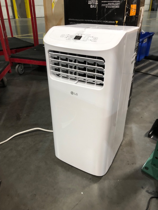 Photo 6 of ***USED - MAJOR DAMAGE - DOESN'T POWER ON - MISSING PARTS - SEE COMMENTS***
LG LP0624WFR Portable Air Conditioner w/Remote, Cools 250 Sq.Ft, Quiet Operation, 115V, 6,000 BTU (9700 ASHRAE), White White 6,000 BTU (9700 ASHRAE)