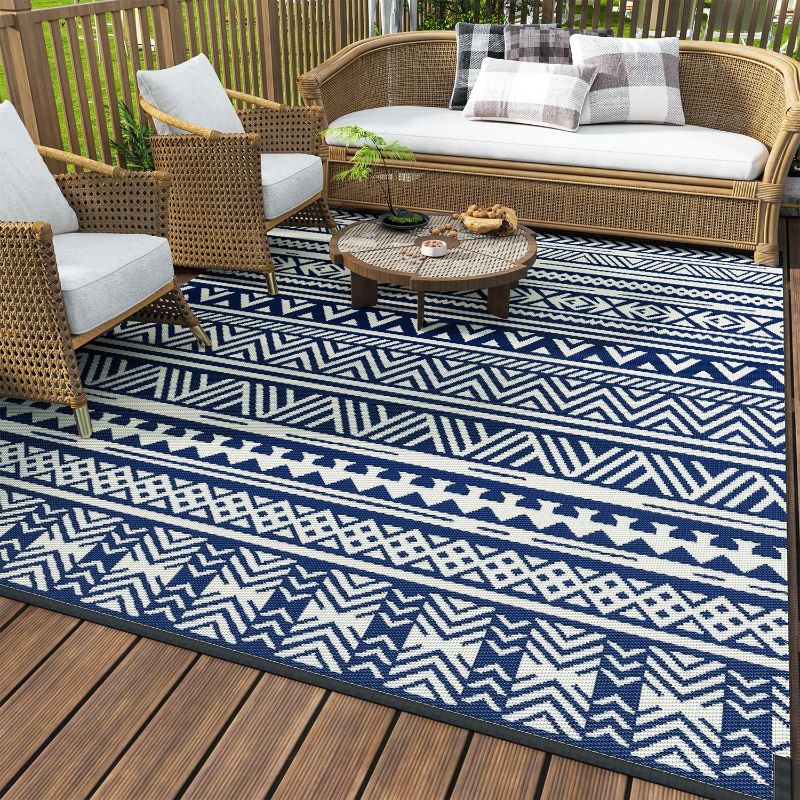 Photo 1 of ****USED** MontVoo-Outdoor Rug Carpet Waterproof 5x8 ft Reversible Patio Rug RV Camping Rug-Plastic Straw Rug Outside Indoor Outdoor Area Rug for Patio Deck Balcony Picnic Beach Outdoor Decor Boho Navy Blue