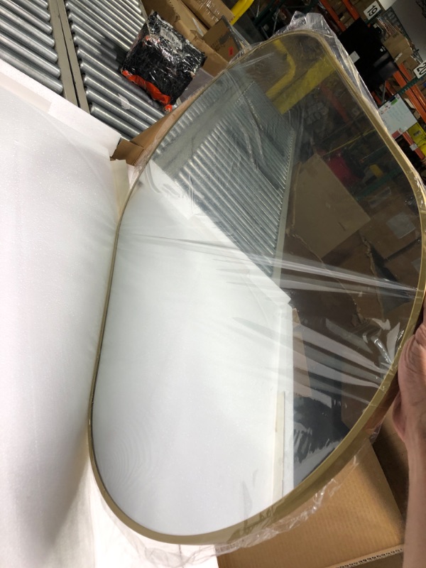 Photo 1 of 22" x 38"Oval Bathroom Mirror Wall Mounted Chic Brushed Metal Frame Hang Vertically & Horizontally Perfect Modern Decor for Bedroom Bathroom Entryway Living Room Gallery Wall,Gold
