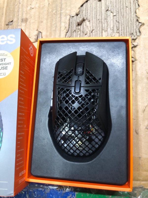Photo 1 of SteelSeries Aerox 9 Wireless - Holey RGB Gaming Mouse - Ultra-lightweight Water Resistant Design - 18 Buttons – Bluetooth/2.4 GHz - 18K DPI TrueMove Air Optical Sensor Onyx Wireless Aerox 9