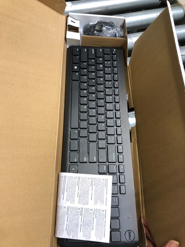 Photo 1 of Dell Wireless Keyboard and Mouse - KM3322W, Wireless - 2.4GHz, Optical LED Sensor, Mechanical Scroll, Anti-Fade Plunger Keys, 6 Multimedia Keys, Tilt Leg - Black