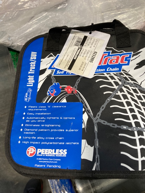 Photo 2 of Peerless 0232805 Auto-Trac Light Truck/SUV Tire Traction Chain - Set of 2 & TireChain.com 39229 Truck Spider Tensioner Tightener Bungee Tire Chains Set of 2, Assorted Series 2300 - 232805 Traction Chain + 39229 Spider Tensioner