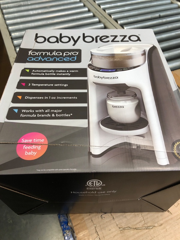 Photo 2 of ****USED*** Baby Brezza New and Improved Formula Pro Advanced Formula Dispenser Machine - Automatically Mix a Warm Formula Bottle Instantly - Easily Make Bottle with Automatic Powder Blending, White Base White