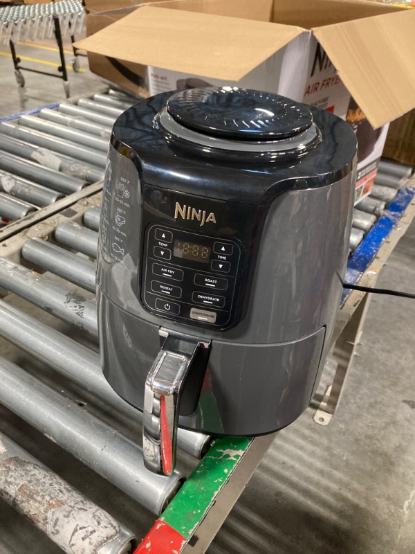 Photo 3 of ** use for parts**
Ninja AF101 Air Fryer that Crisps, Roasts, Reheats, & Dehydrates, for Quick, Easy Meals, 4 Quart Capacity, & High Gloss Finish, Black/Grey 4 Quarts