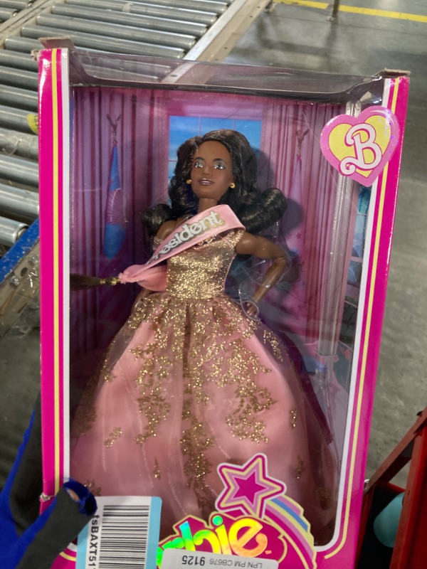 Photo 2 of Barbie The Movie Doll, President Collectible Wearing Shimmery Pink and Gold Dress with Sash
