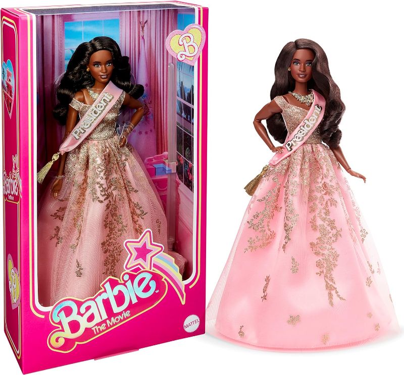 Photo 1 of Barbie The Movie Doll, President Collectible Wearing Shimmery Pink and Gold Dress with Sash
