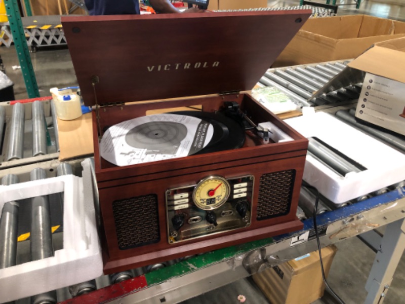 Photo 4 of ** use for parts***
Victrola Nostalgic 6-in-1 Bluetooth Record Player & Multimedia Center with Built-in Speakers - 3-Speed Turntable, CD & Cassette Player, FM Radio | Wireless Music Streaming | Mahogany Mahogany Entertainment Center