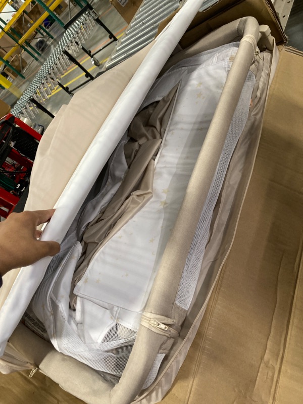 Photo 1 of Evolur Stellar Bassinet and Bedside Sleeper, Easy to Fold and Carry, Lightweight and Portable Baby Bassinet, Height Adjustable, Mattress Pad Included, Beige