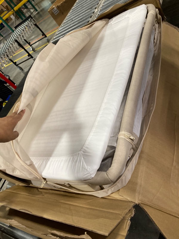Photo 1 of Evolur Stellar Bassinet and Bedside Sleeper, Easy to Fold and Carry, Lightweight and Portable Baby Bassinet, Height Adjustable, Mattress Pad Included, Beige