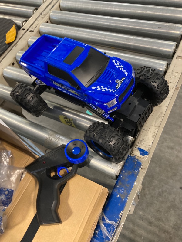 Photo 2 of DOUBLE E RC Cars Remote Control Car 1:12 Off Road Monster Truck for Boy Adult Gifts,2.4Ghz All Terrain Hobby Car,4WD Dual Motors LED Headlight Rock Crawler Blue Large