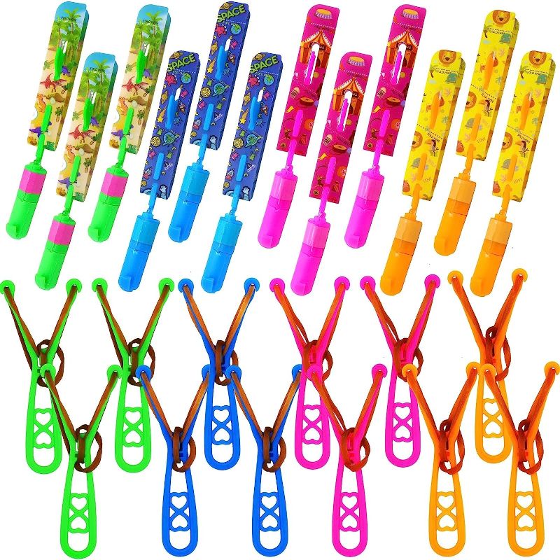 Photo 1 of JX Rocket Slingshot Flying Toys with Led Lights,12Pcs LED Arrow Helicopters + 12Pcs Launchers,Summer Outdoor Game LED Slingshot Toy for Kids, Glow in The Dark Kids Party Supplies
