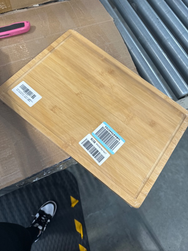 Photo 1 of Bamboo Cutting Board for Kitchen, 18" Large Wood Charcuterie Cheese Board, Wooden Chopping Block with Side Handles and Juice Grooves
