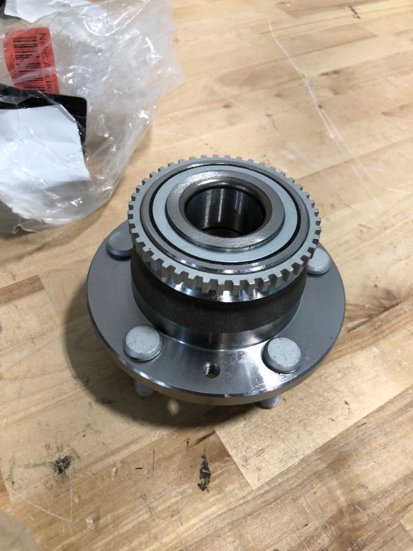 Photo 1 of Motorcraft NHUB51 - Front Passenger Side High Level Service Design Wheel Bearing And Hub Assembly
