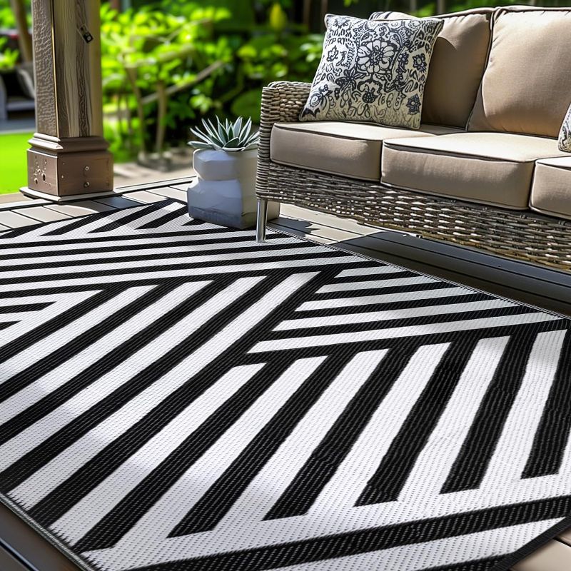 Photo 1 of ****USED*** Outdoor Patio Rugs Reversible Camping - Outdoor Plastic Straw Rug Area Carpet Clearance for Outside, Porch, RV, Balcony & Backyard, Large Outdoor Mat Stain & UV Resistant
