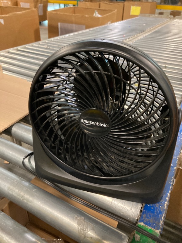 Photo 2 of ** use for parts***
Amazon Basics 11-Inch Air Circulator Fan with 90-Degree Tilt Head and 3 Speed Settings, Ultra Quiet (30 dB), Lightweight (3 LBS), Black, 6.3"D x 11.1"W x 10.9"H
