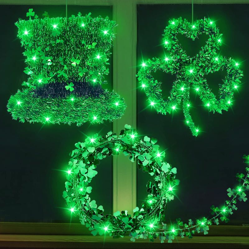 Photo 1 of " NEW FACTORY SEALED" ST.PATRICK'S DAY DECORATIONS LIGHTS PRELIT 3PACK TINSEL SHAMROCKS ST.PATRICK'S DAY WREATH STRING LIGHTS 20 LED BATTERY OPERATED LEPRECHAUN HAT WIRE GARLAND IRISH ST.PATRICK DECOR INDOOR HOME OUTDOOR SHAMROCK WREATH
