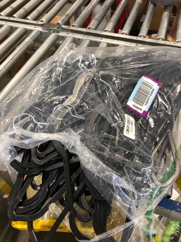 Photo 1 of **SIMILAR ITEM** Plastic Clothes Hanger Set - 50 Pieces Versatile, Lightweight, Space-Saving, Non-Slip, Slim Designed, Dry and Wet Clothes Hanger Set - Black
