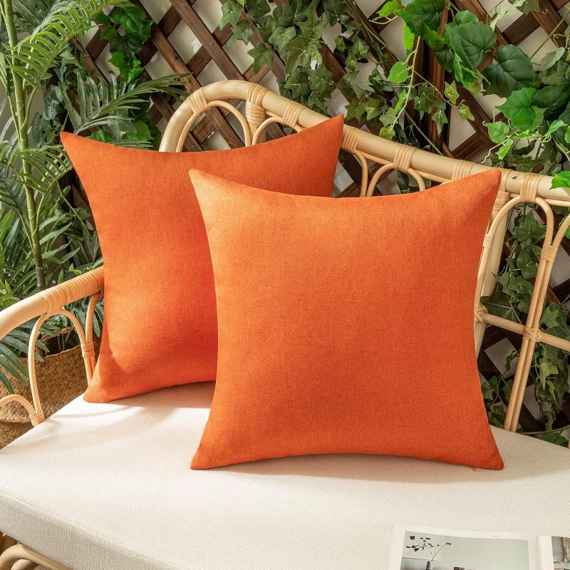 Photo 1 of ****USED*** Woaboy Set of 2 Outdoor Waterproof Pillow Covers 16x16 Inch Bright Orange Decorative Farmhouse Throw Pillow Covers Square Solid Color Couch Pillow Covers for Patio Tent Bed Sofa Living Room