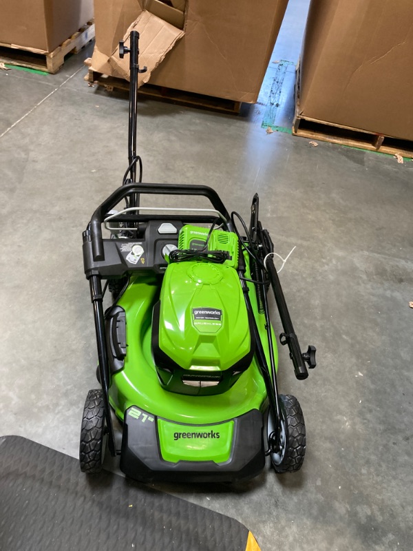 Photo 2 of ***MISSING HARDWARE**
Greenworks  21" (Push) Lawn Mower, 5.0Ah Battery, 4A Charger
