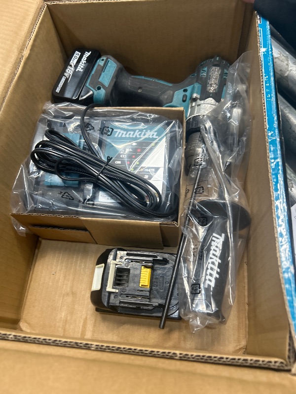 Photo 2 of ***MISSING IMPACT DRIVER, DRILL AND BATTERY HEAVY USAGE***
 Makita XT288T 18V LXT® Lithium-Ion Brushless Cordless 2-Pc. Combo Kit (5.0Ah)