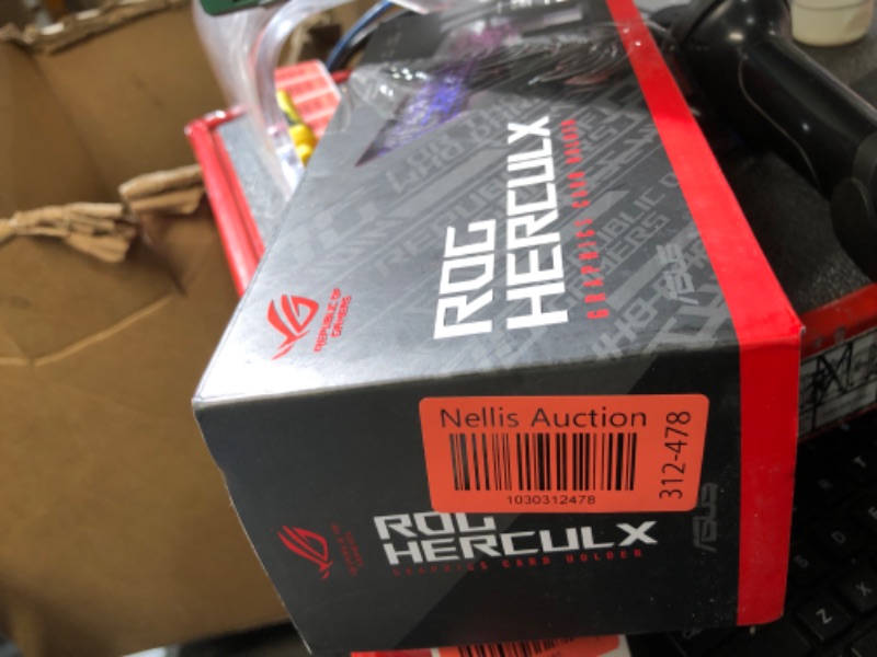 Photo 1 of ***SEE NOTES***

ASUS ROG Herculx Graphics Card Anti-Sag Holder Bracket (Solid Zinc Alloy Construction, Easy Toolless Installation, Included Spirit Level, Adjustable Height, Wide Compatibility, Aura Sync RGB)