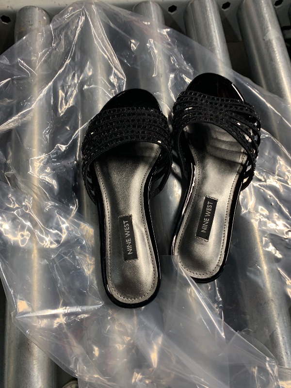 Photo 1 of ***(HEAVILY USED)***
Nine West Women's Lacee2 Flat Sandal, Black 001, 5.5