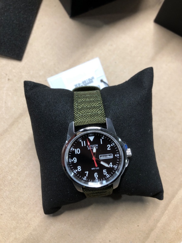 Photo 1 of Citizen Men's Eco-Drive Weekender Garrison Field Watch in Stainless Steel with Olive Nylon strap, Black Dial (Model: BM8180-03E)
