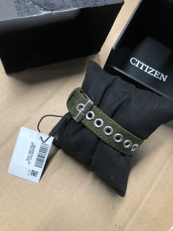 Photo 1 of Citizen Men's Eco-Drive Weekender Garrison Field Watch in Stainless Steel with Olive Nylon strap, Black Dial (Model: BM8180-03E)