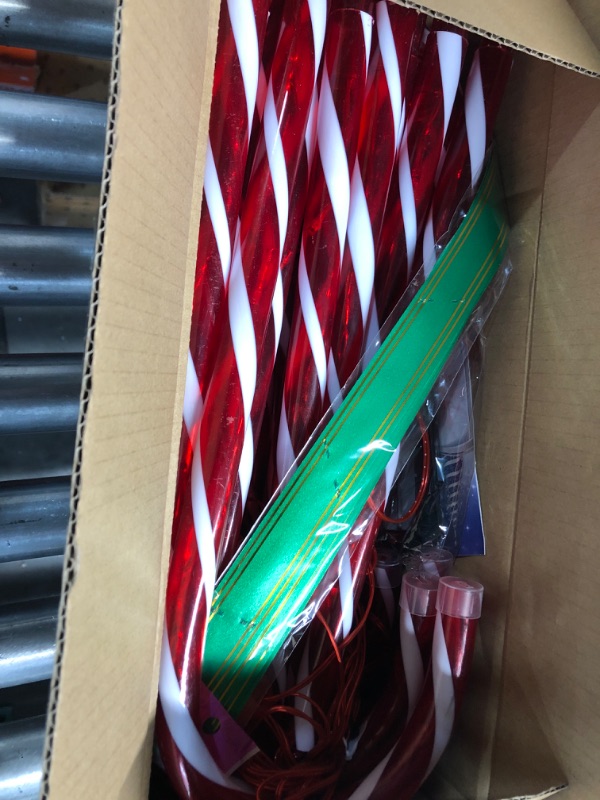 Photo 1 of (USED)  Pytopkto 35" Christmas Candy Cane Lights 12pcs - 8 Modes,Christmas Outdoor Christmas Decorations, Walkway Lights,Christmas Decor,Xmas Outside Decoration for Yard Lawn Forecourt or Dooryard