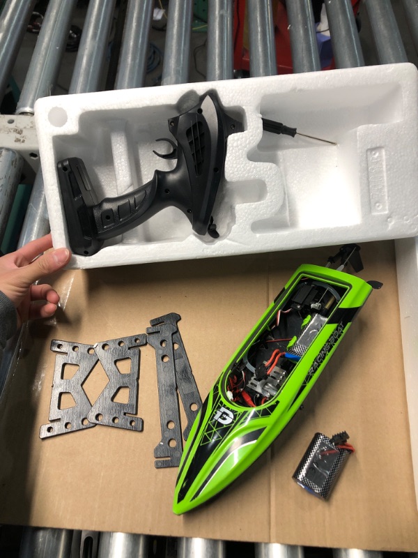 Photo 4 of **FOR PARTS ONLY**(NON REFUNDABLE)
DEERC RC Boat with LED Light, 30+ Mins, Self Righting Remote Control Boat for Pools & Lakes, 20+ MPH, 2.4GHz Racing Boats, 2 Battery, Pool Toys for Kids, Radio Controlled Watercraft