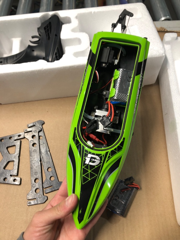 Photo 2 of **FOR PARTS ONLY**(NON REFUNDABLE)
DEERC RC Boat with LED Light, 30+ Mins, Self Righting Remote Control Boat for Pools & Lakes, 20+ MPH, 2.4GHz Racing Boats, 2 Battery, Pool Toys for Kids, Radio Controlled Watercraft