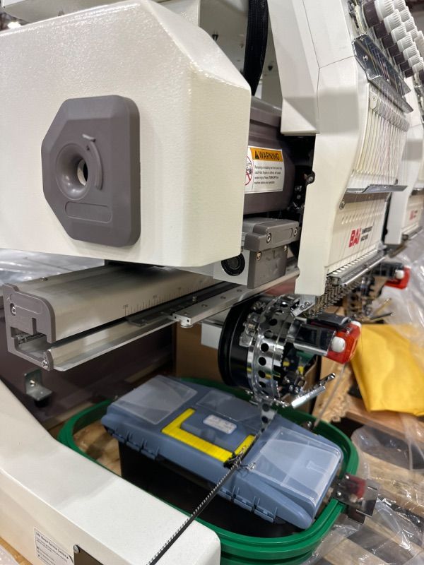 Photo 6 of *****CANNOT BE FULLY TESTED, SOME DAMAGED PARTS SHOWN ***** BAi VisionV22-2 Two Head Multi Needles has 17.7x15.7 Inches Embroidery Area and Wide Arm System, Heavy Duty Structure Industrial Embroidery Machine for Hat
