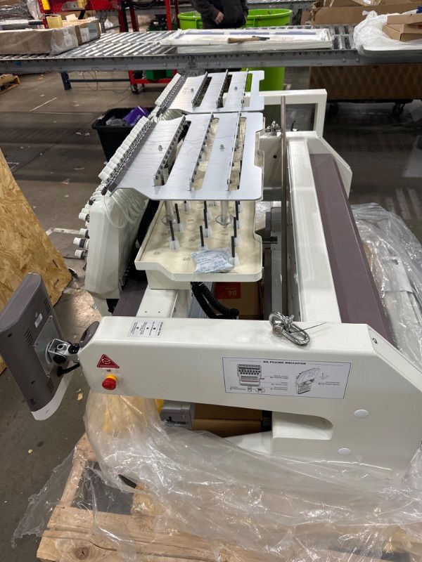 Photo 1 of *****CANNOT BE FULLY TESTED, SOME DAMAGED PARTS SHOWN ***** BAi VisionV22-2 Two Head Multi Needles has 17.7x15.7 Inches Embroidery Area and Wide Arm System, Heavy Duty Structure Industrial Embroidery Machine for Hat
