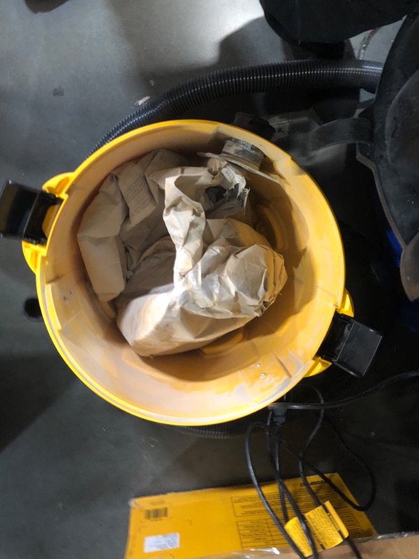 Photo 5 of ***HEAVILY USED AND DIRTY - FILLED WITH CONCRETE - SEE PICTURES - POWERS ON - UNABLE TO TEST FURTHER - MIGHT BE MISSING PARTS***
DEWALT Stealthsonic Quiet 9-Gallon 5-HP Corded Wet/Dry Shop Vacuum with Accessories Included