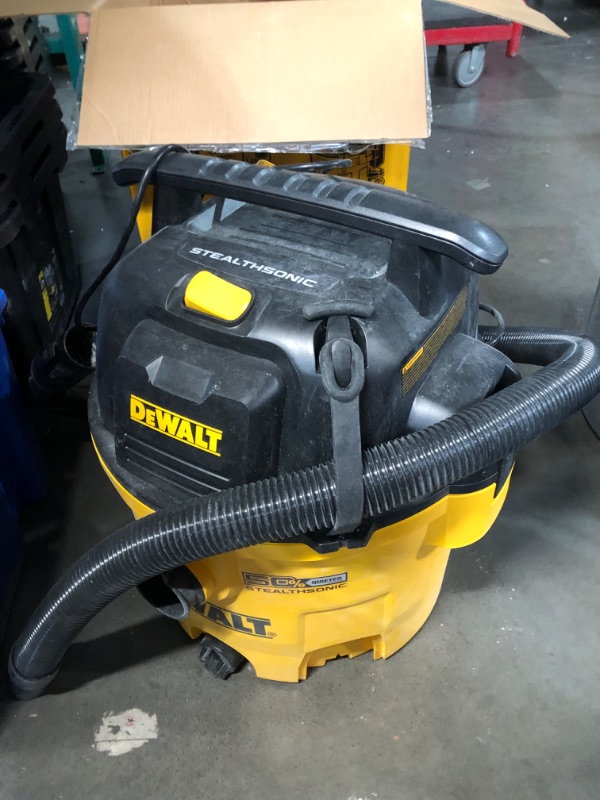 Photo 2 of ***HEAVILY USED AND DIRTY - FILLED WITH CONCRETE - SEE PICTURES - POWERS ON - UNABLE TO TEST FURTHER - MIGHT BE MISSING PARTS***
DEWALT Stealthsonic Quiet 9-Gallon 5-HP Corded Wet/Dry Shop Vacuum with Accessories Included