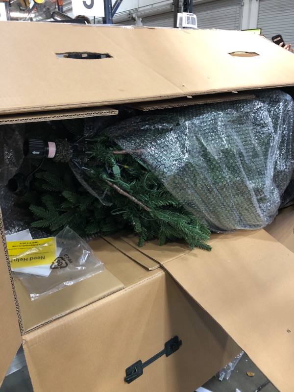 Photo 2 of ***USED - POWER CONNECTOR AND REMOTE HAVE BEEN CUT OFF***
Evergreen Classics 7.5 ft Twinkly Pre-Lit Aspen Pine Quick Set Artificial Christmas Tree