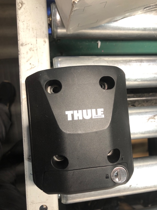 Photo 1 of **NON-REFUNDABLE, PARTS ONLY, MISSING BACK PORTION OF LOCK***
Thule Quick Release Bracket, Black (100203)
