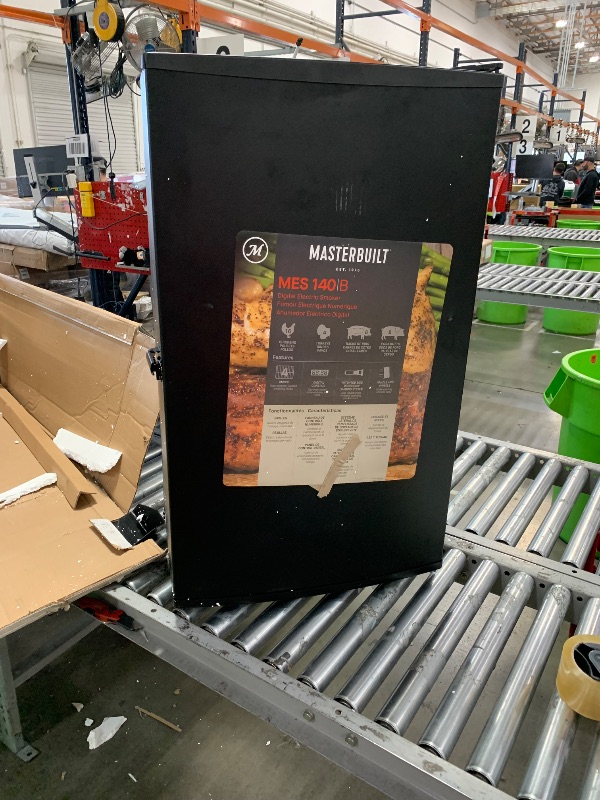 Photo 2 of ***DAMAGED - MISSING PARTS - NO PACKAGING - SEE COMMENTS***
Masterbuilt® 40-inch Digital Electric Vertical BBQ Smoker with Side Wood Chip Loader