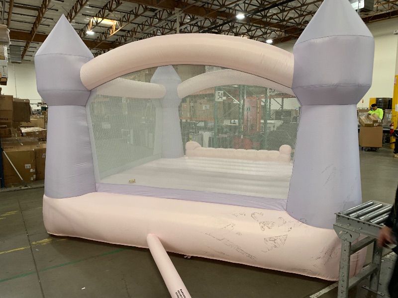 Photo 2 of   Bounceland Party Castle DayDreamer Cotton Candy Bounce House, 16.4 ft L x 13.1 ft W x 9.3 ft H, Basketball Hoop, UL Blower included, Trendy Pastel Color, Fun Slide & Bounce Area, Castle Theme for Kids
