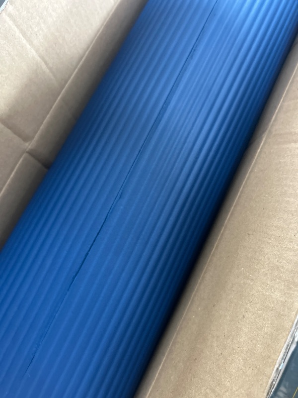 Photo 1 of ***BOX CUTTER DAMAGE, SEE PHOTO**
blue yoga mat